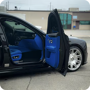 Figure → Full car detailing on luxury vehicle including interior and exterior deep clean with hydrophobic coating.